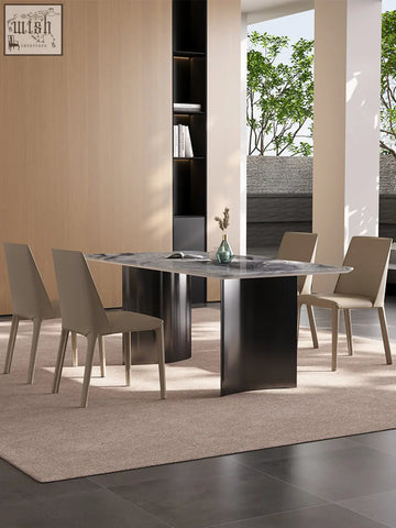 Modern angela marble dining table with sleek gray marble top and dark matte legs for luxury dining spaces