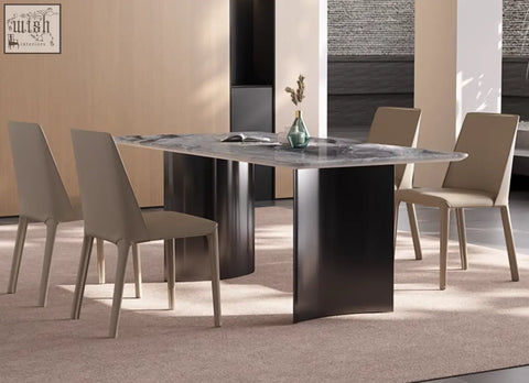 Modern angela marble dining table with sleek gray marble top and dark cylindrical legs for luxury dining experiences