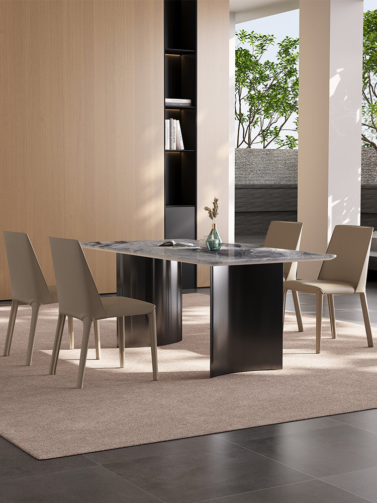 Angela dining table with a sleek gray marble top and dark matte legs perfect for luxury dining and offer financing options