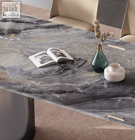 Angela marble dining table with sleek dark gray marble top featuring white and gold veining for luxury dining
