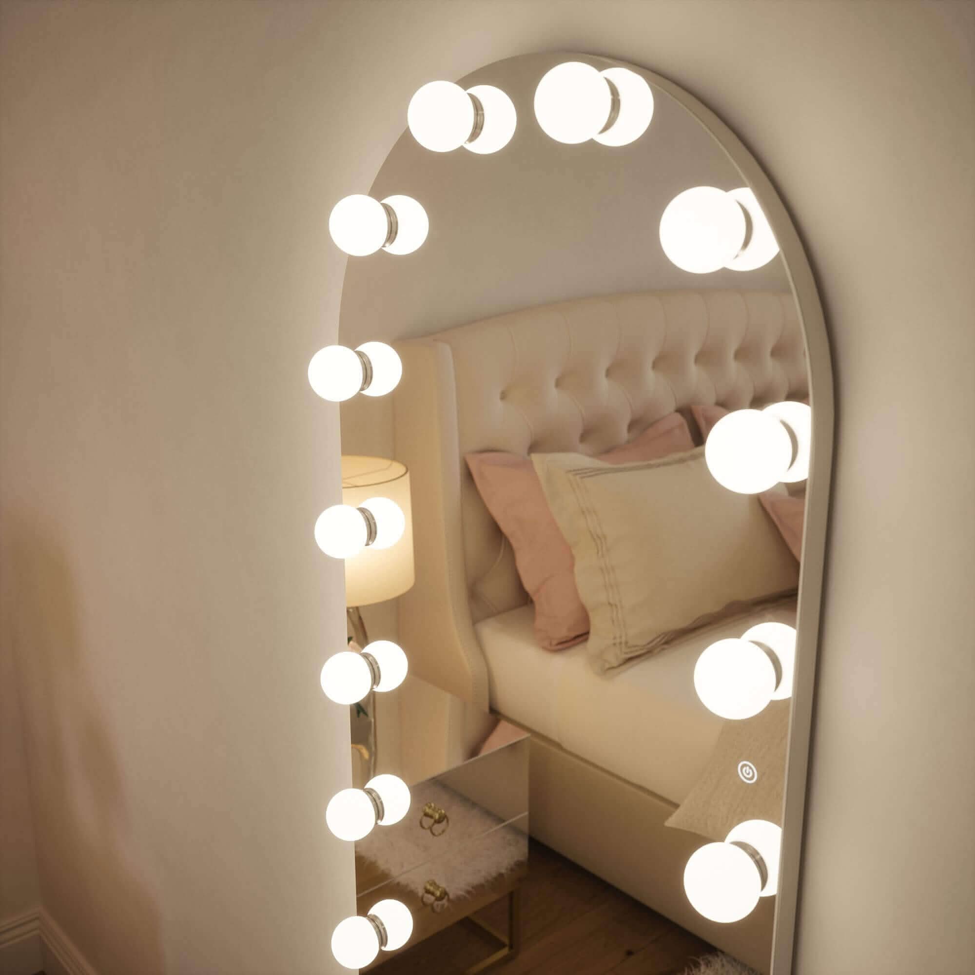 Arched vanity mirror from the mirrors collection with a sleek white frame and round bulbs perfect for glam spaces