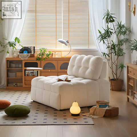 Cream-colored plush tufted anika armchair single sofa bed with soft fluffy texture and cozy modern design