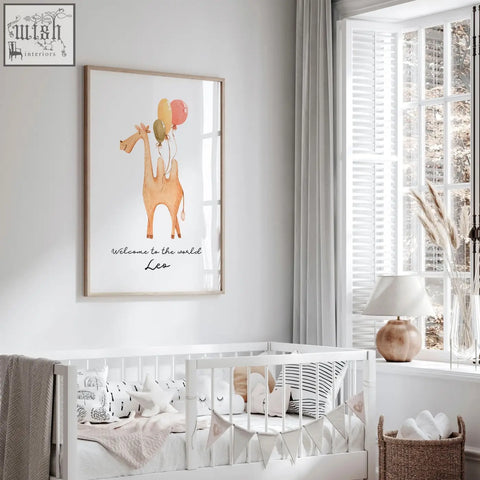 A framed tan camel animal print with colorful balloons and welcome to the world leo text for nursery decor