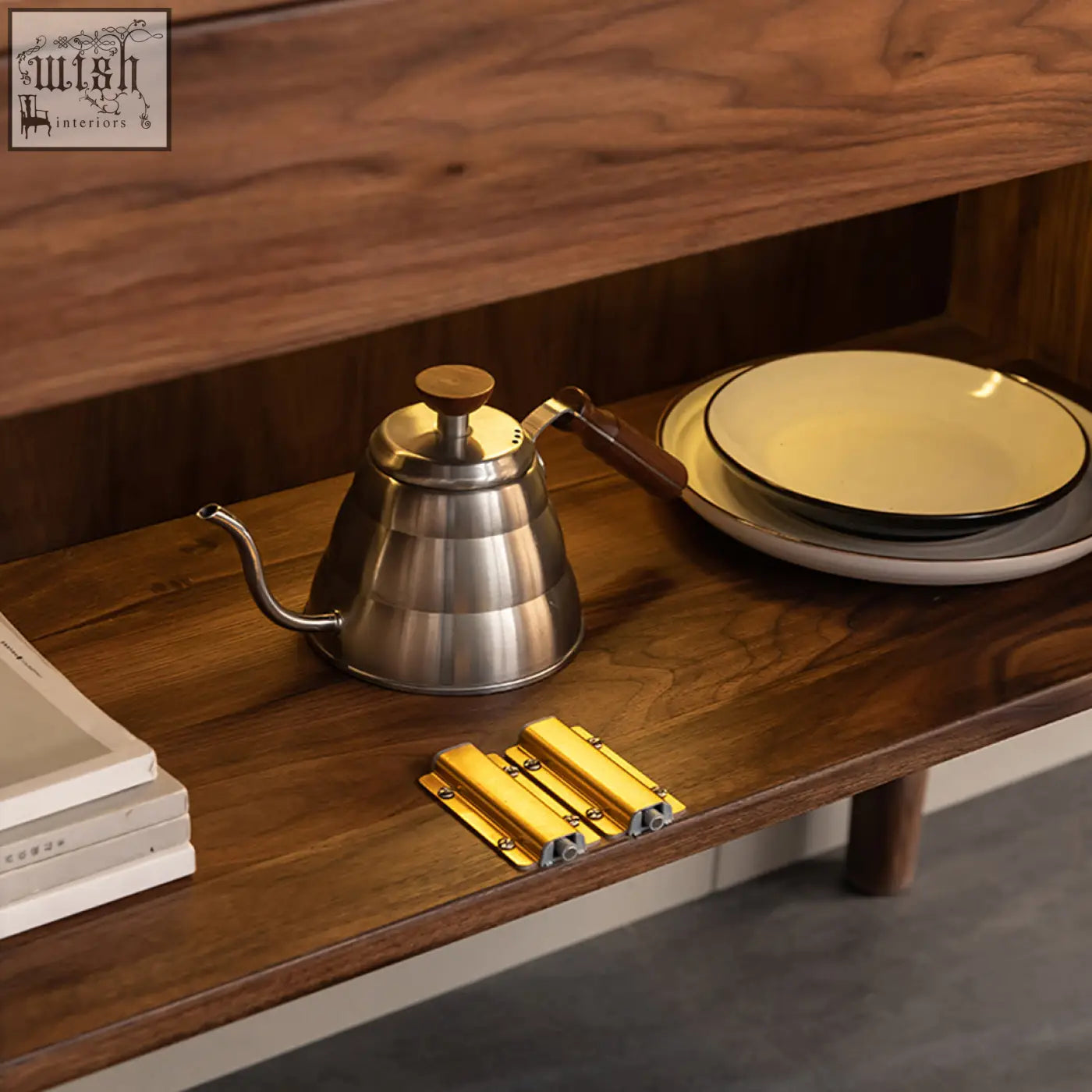 Stainless steel gooseneck kettle with wooden handle and lid on solid wood anisimov cabinet wine storage wine rack