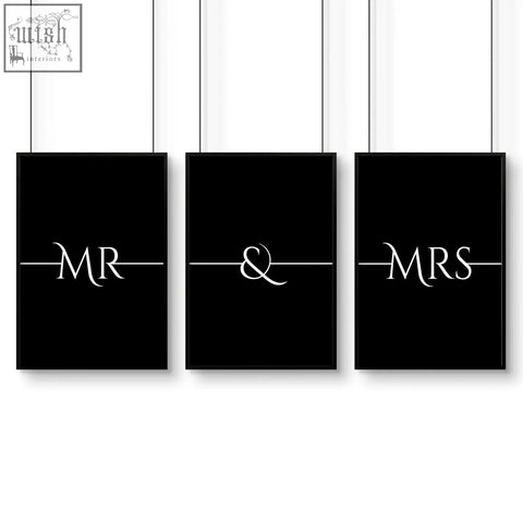 Set of three black-framed minimalist wall art prints with elegant white mr and mrs typography for anniversary gifts