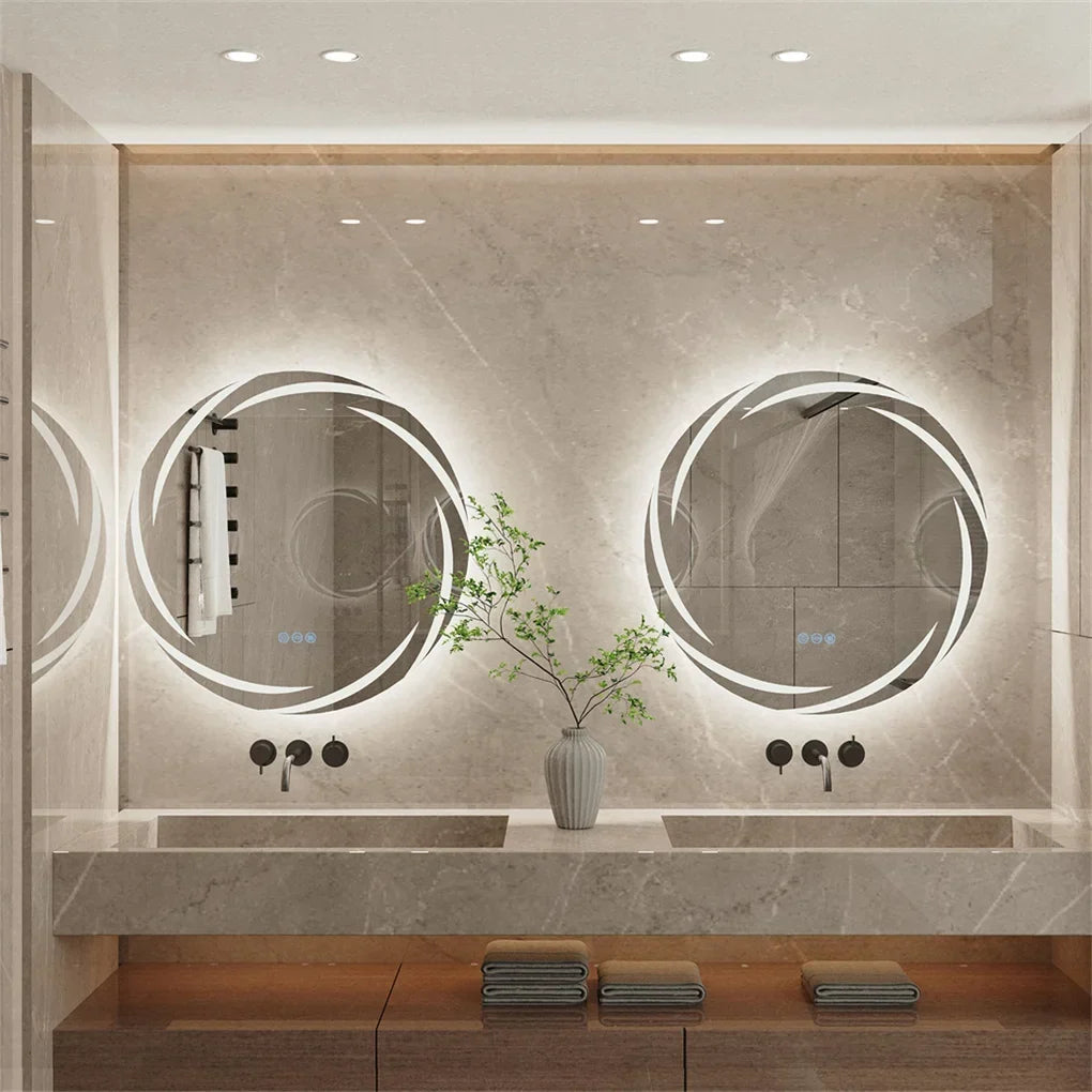 Two circular led bathroom mirrors with white backlit rings and minimalist black fixtures perfect for vanity use