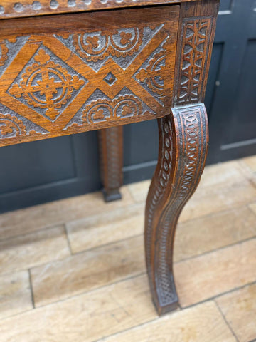 Antique anglo-indian carved oak hall table with intricate geometric and floral inlaid carvings sideboard console