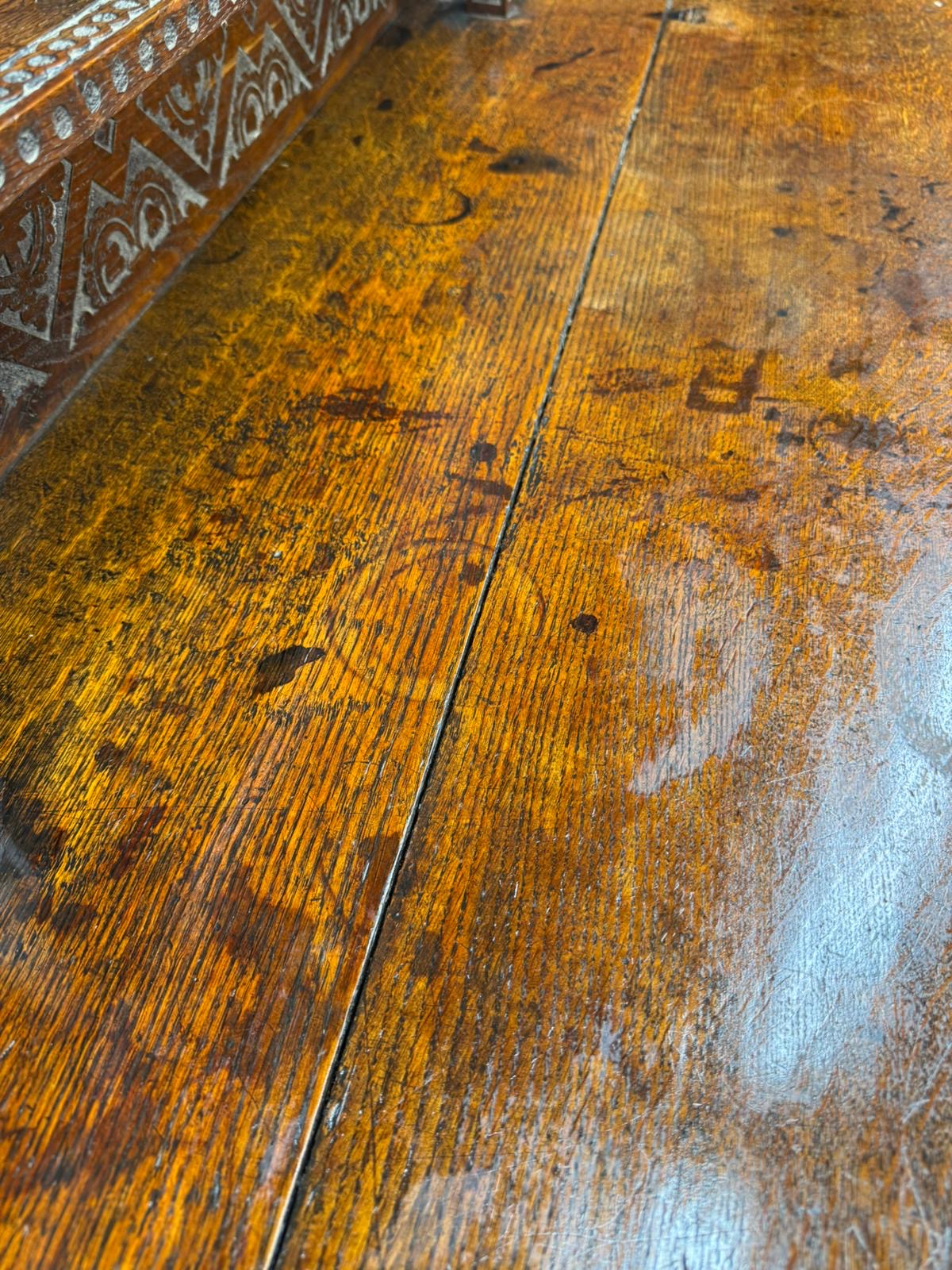 Antique carved oak hall table with rich amber finish and intricate detailing perfect as a hall table or sideboard
