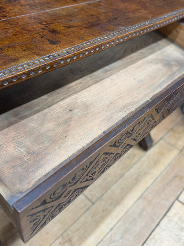 Antique carved oak hall table with dark brown finish and intricate inlaid patterns perfect as an oak hall table