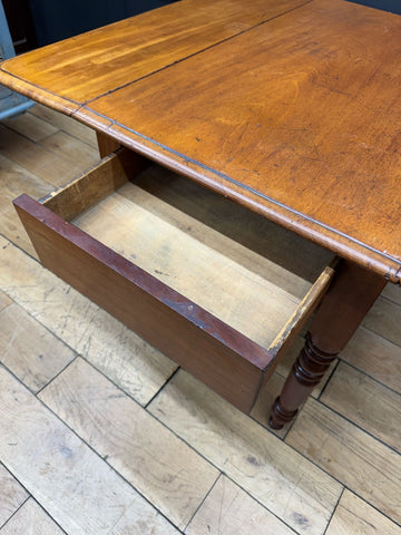 Antique mahogany drop leaf pembroke table with turned legs and single drawer for extra surface and storage