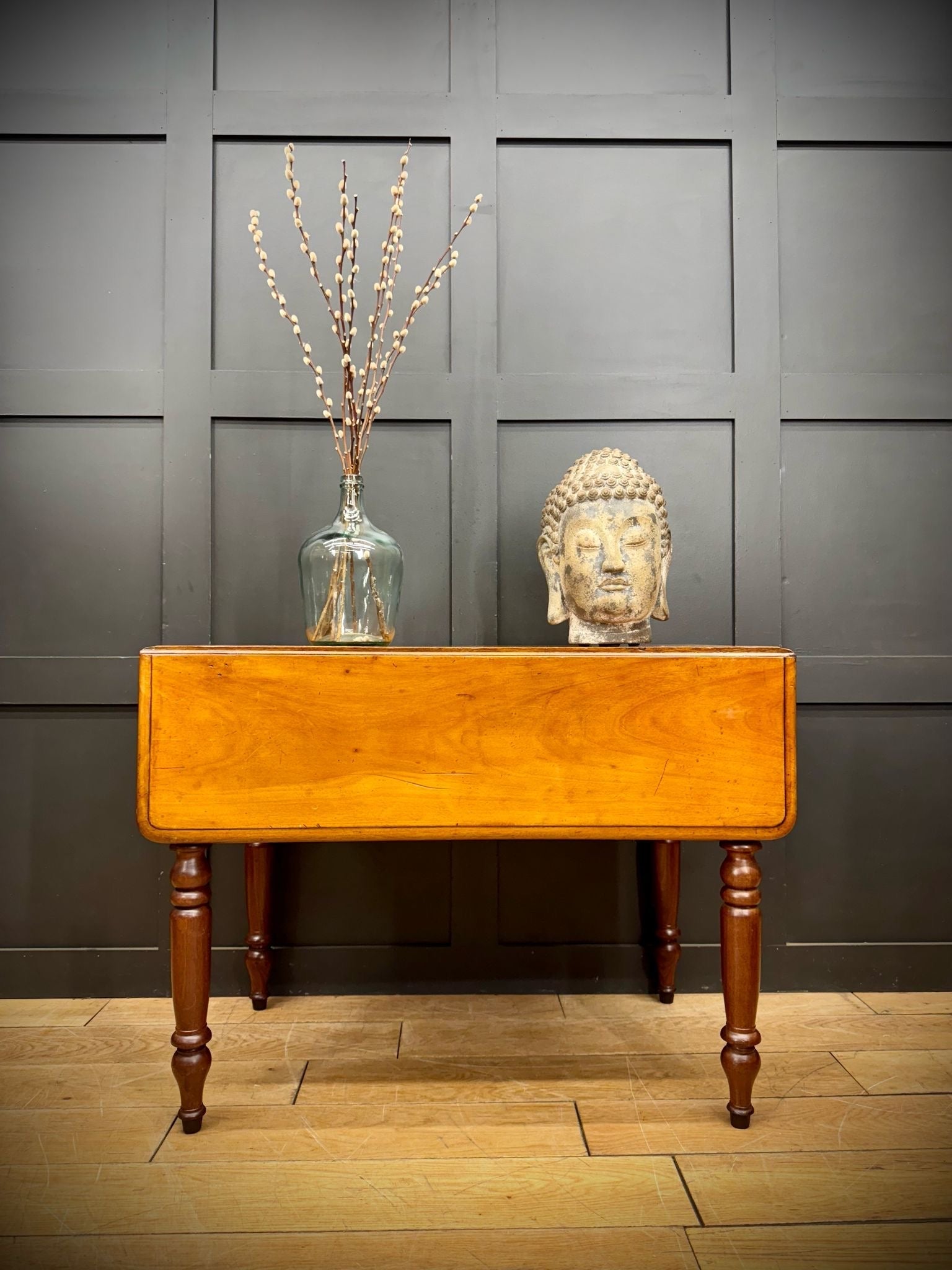 Antique mahogany drop leaf Pembroke table with warm polished finish and turned legs perfect as sideboard with drawer