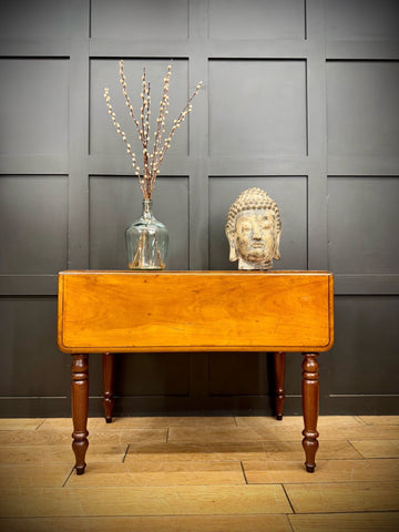 Antique mahogany drop leaf Pembroke table with warm polished finish and turned legs perfect as sideboard with drawer