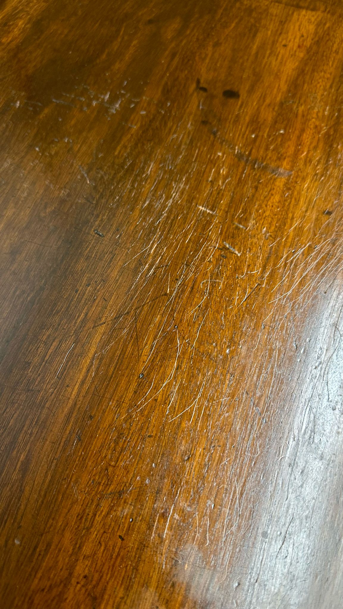 Antique extending mahogany tea table with rich warm-toned wooden surface and visible grain perfect for games or occasional use