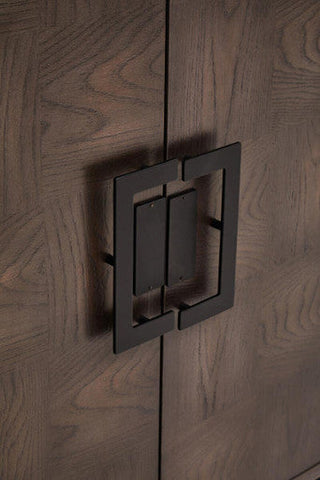 Black rectangular cabinet handle on a modern dimaro 4-door antique grey sideboard with a minimalist design