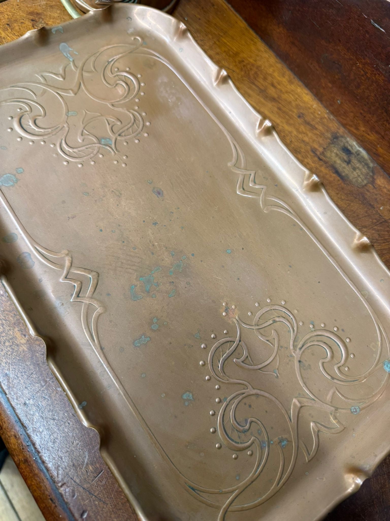 Antique joseph sankey art nouveau brass serving tray with ornate embossed floral patterns and subtle patina