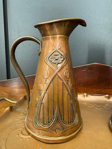 Antique joseph sankey copper pitcher with intricate art nouveau floral and geometric embossing in warm copper tone