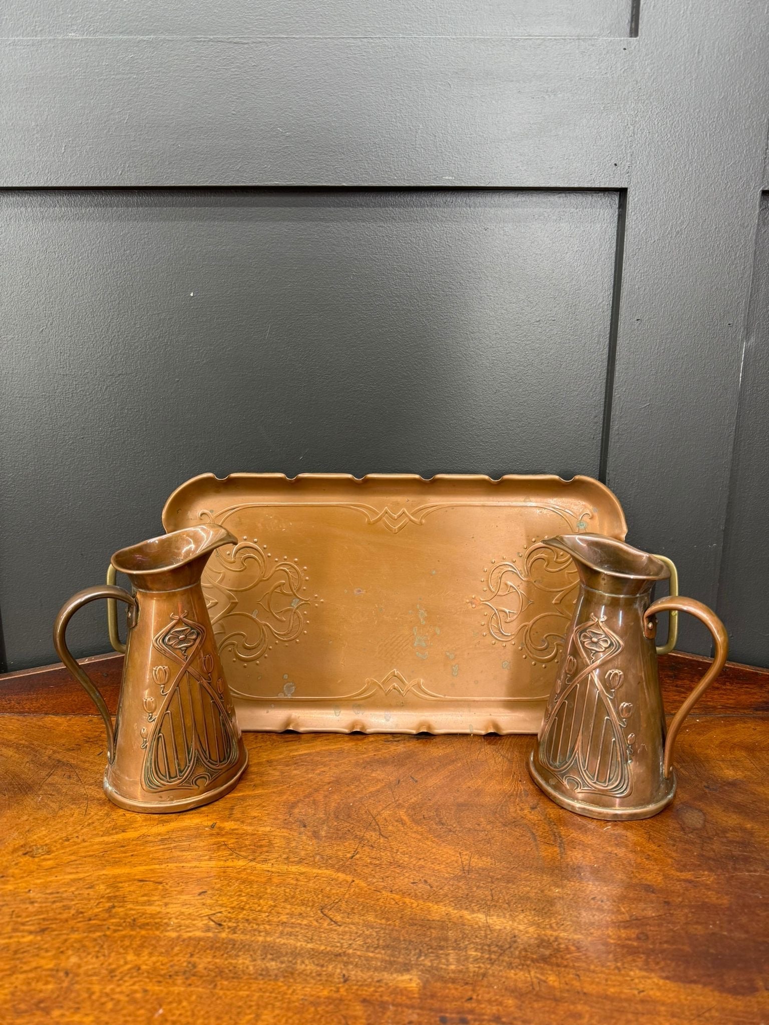 Antique joseph sankey copper jugs and tray set with ornate art nouveau detailing in matching rectangular design