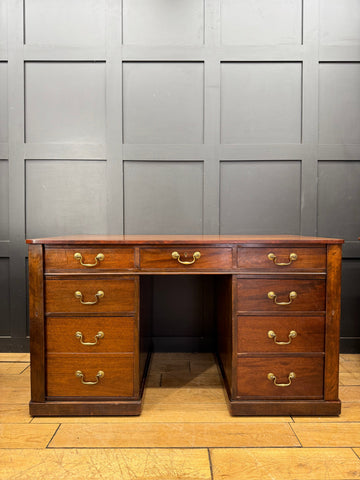Antique mahogany twin pedestal desk with brass handles and central open kneehole perfect for writing or office use