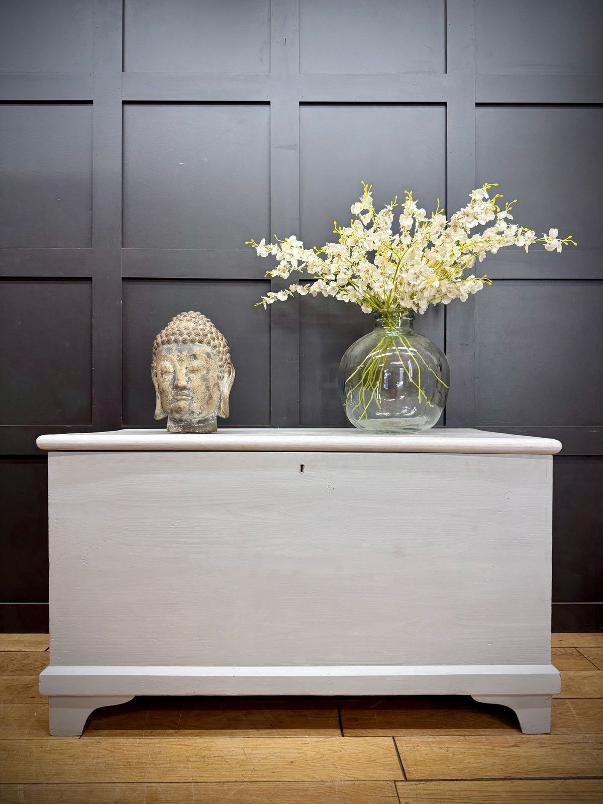 White painted wooden blanket chest with keyhole for shoe storage and storage trunk bench use