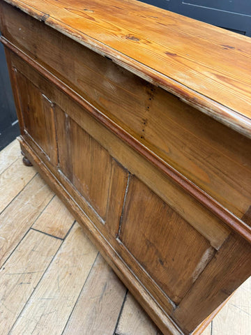 Antique pine pedestal desk dressing table with cupboards and drawers featuring a warm weathered wooden chest