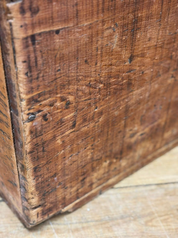 Weathered brown antique pine storage chest with visible grain and rustic aged pine for blankets or coffee table use
