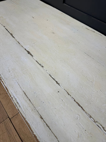 Distressed white painted pine trunk with visible wood grain and chipped edges perfect as a blanket box or sideboard