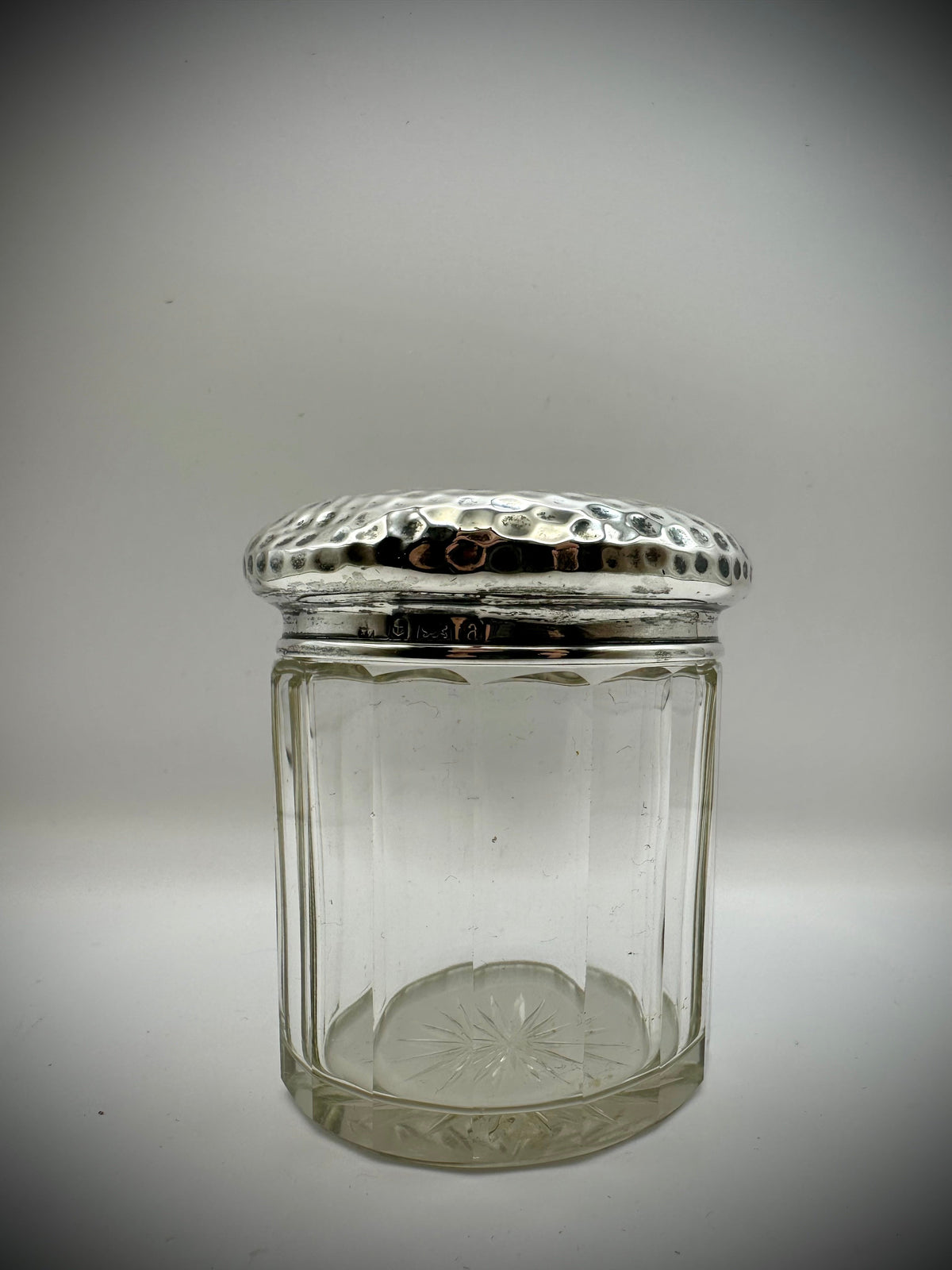 Antique cut glass pot with a silver topped hammered sterling silver lid inscribed with milly