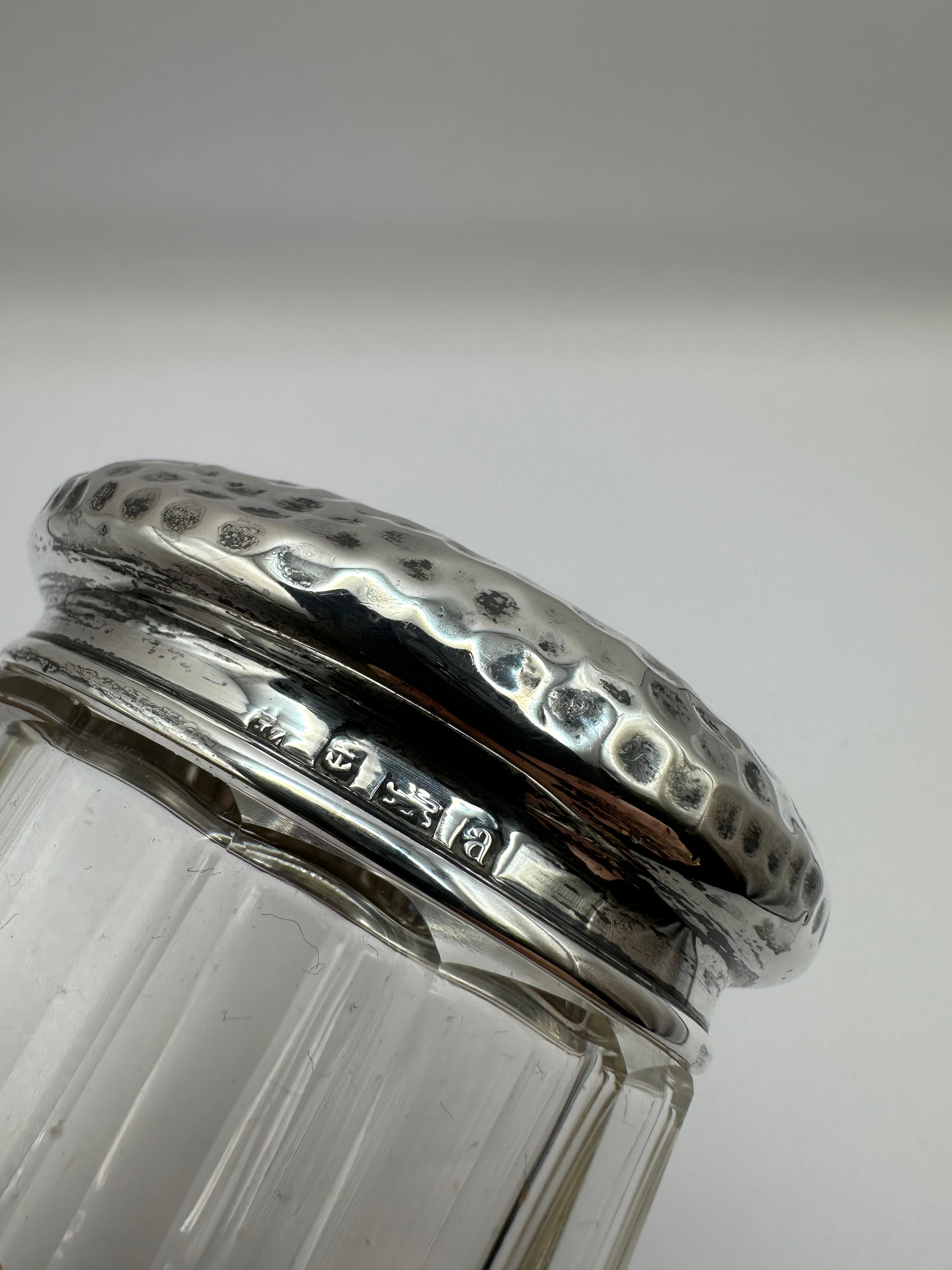 Antique solid sterling silver topped cut glass pot with hammered lid and engraved markings inscribed with milly