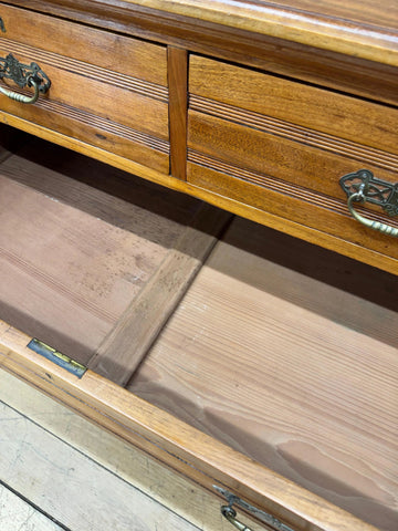 Antique solid walnut chest of drawers with two drawers, ornate metal handles, and subtle wood grain for bedroom storage