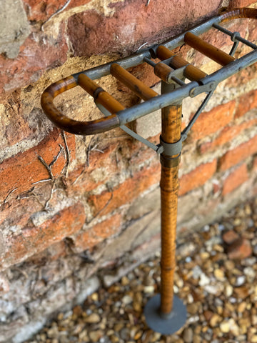 Antique victorian bamboo shooting stick umbrella stand with curved metal frame wooden dowels and sturdy base
