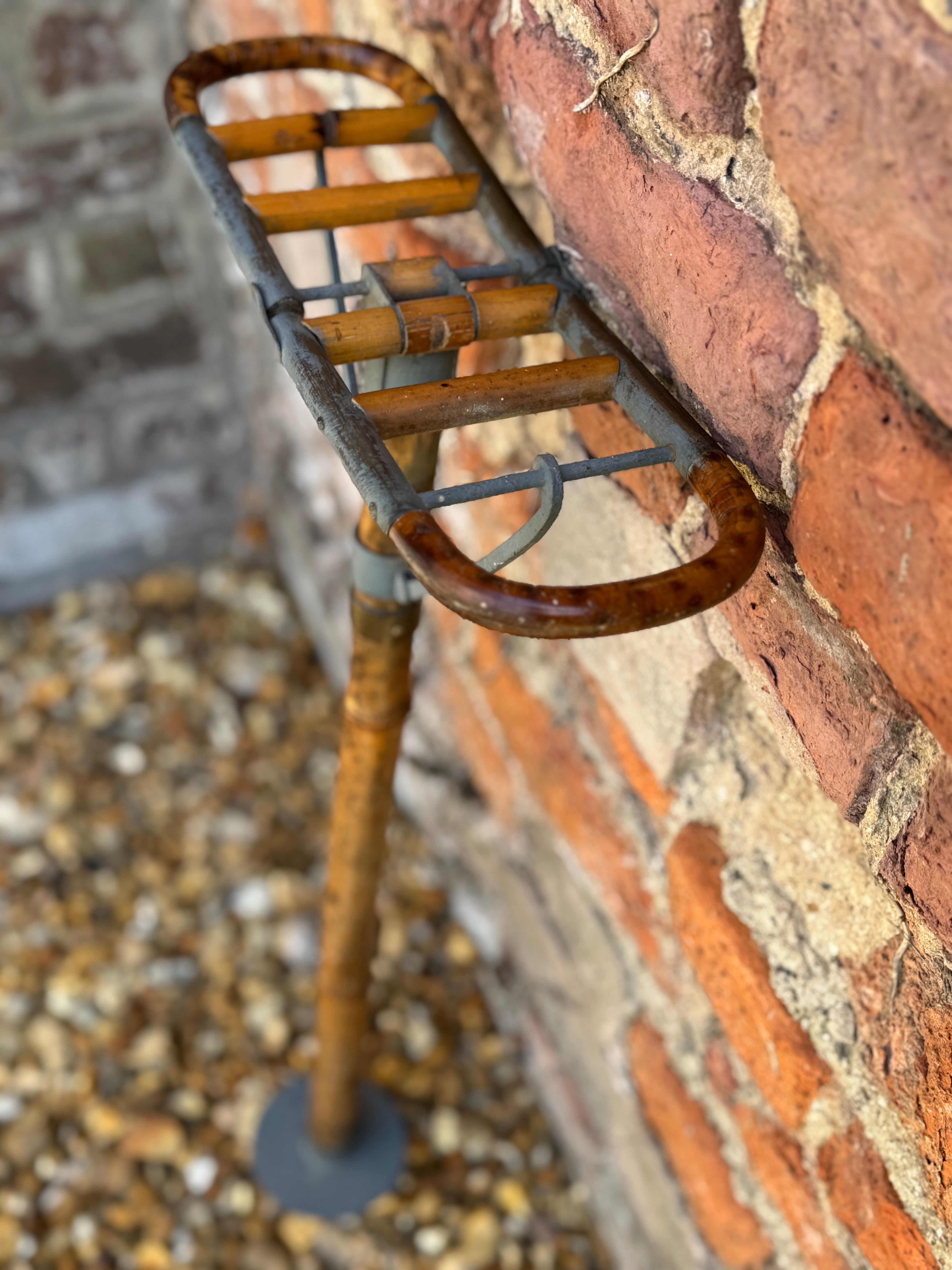 Rustic antique victorian bamboo shooting stick with curved handle wooden slats and metal base for outdoor use