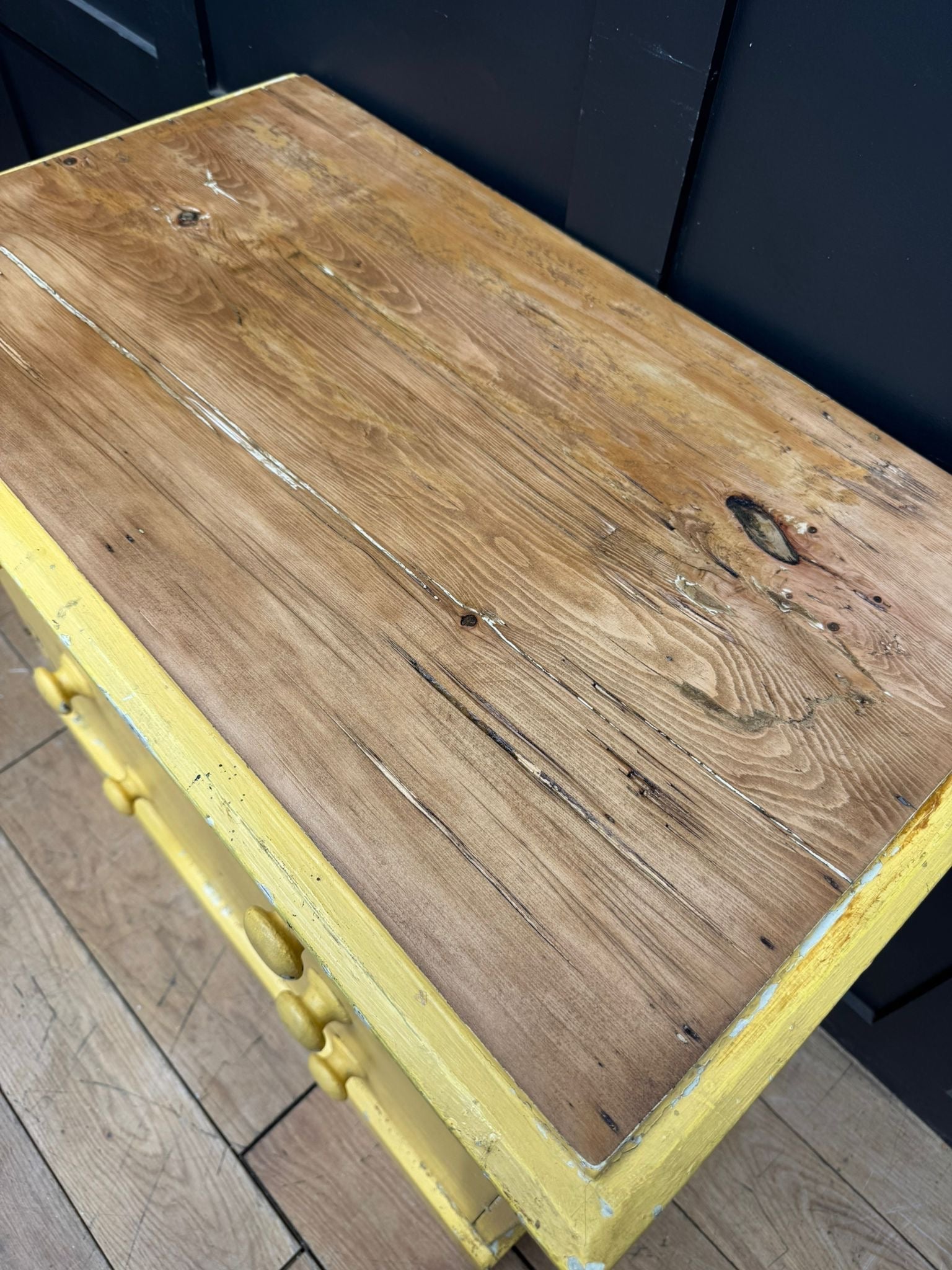 Yellow pine chest with rustic distressed finish and visible wood grain for farmhouse bedroom storage and sink stand
