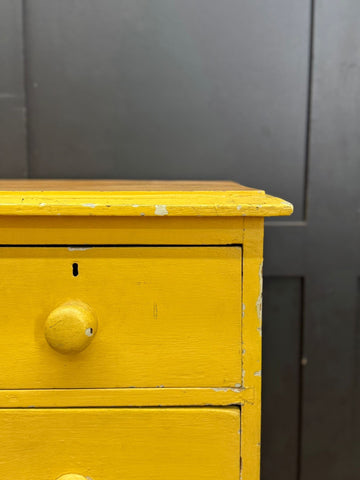 Antique yellow pine chest with distressed finish and round knob handles perfect for farmhouse bedroom storage