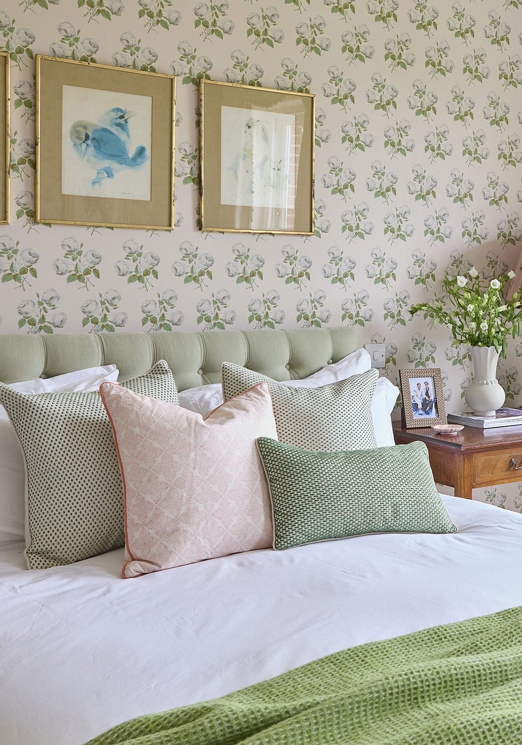 A tufted sage green cushion cover with soft upholstery and subtle button details from antonia blush trellis collection