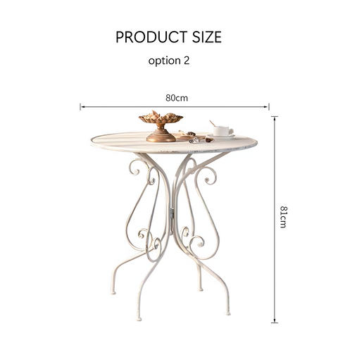 White wrought iron antonia outdoor garden dining table with ornate scrollwork legs and distressed finish
