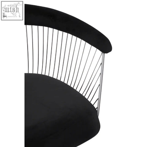 Anzio black velvet chair with curved backrest and brushed silver slender metal frame for stylish seating