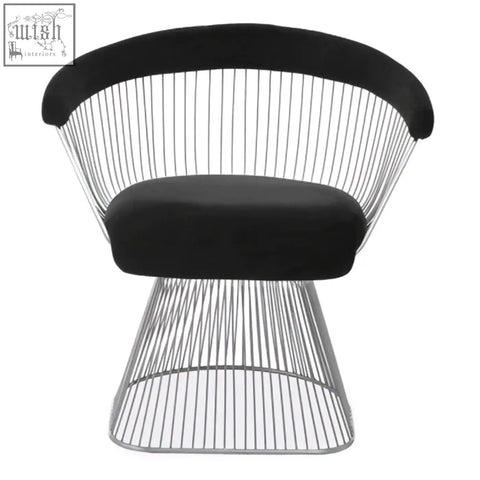 Black velvet anzio chair with curved armrests and sleek brushed silver wireframe base for stylish seating
