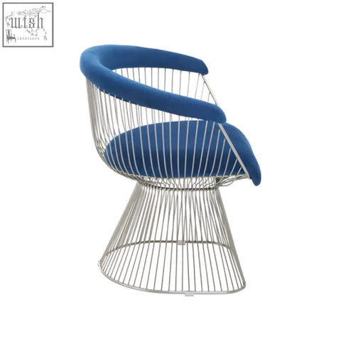 Anzio navy blue velvet chair with brushed silver wireframe and modern sculptural design for stylish seating