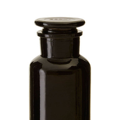 Apothecary black glass reagent bottle with matching black stopper made from durable black glass for safe storage