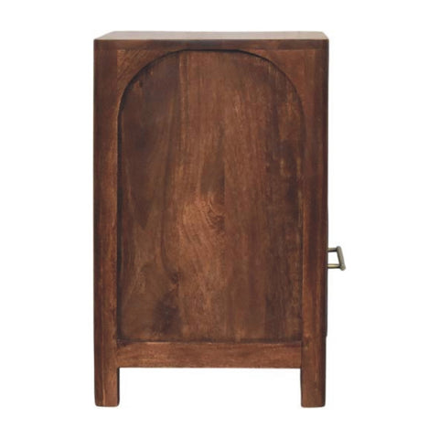 Dark brown wooden bedside table with arched door, small metal handle, and open shelf in roasted almond finish