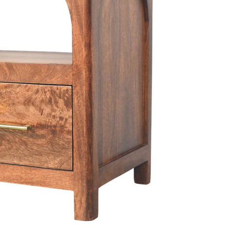 Rich brown wooden arc-line media console table with curved top and brass handle drawer in living room with roasted almond finish