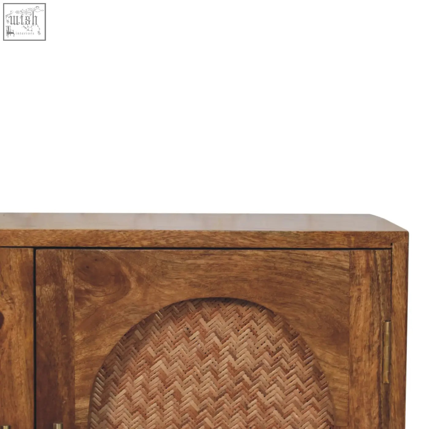 A rustic wooden sideboard with natural finish and arched woven rattan panels on two doors