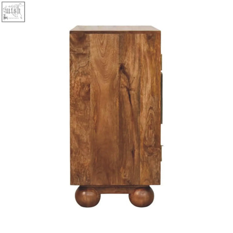 A rustic arched rattan two-door sideboard with warm brown finish and natural wood grain patterns