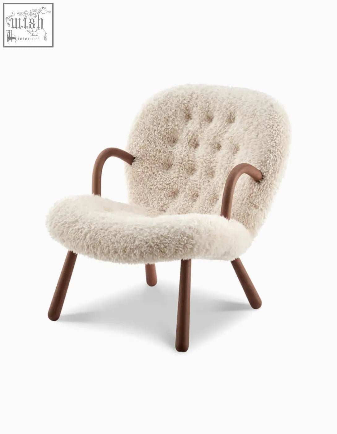 Cream-colored arctander clam armchair sheepskin with tufted back and curved wooden arms long hair upholstery