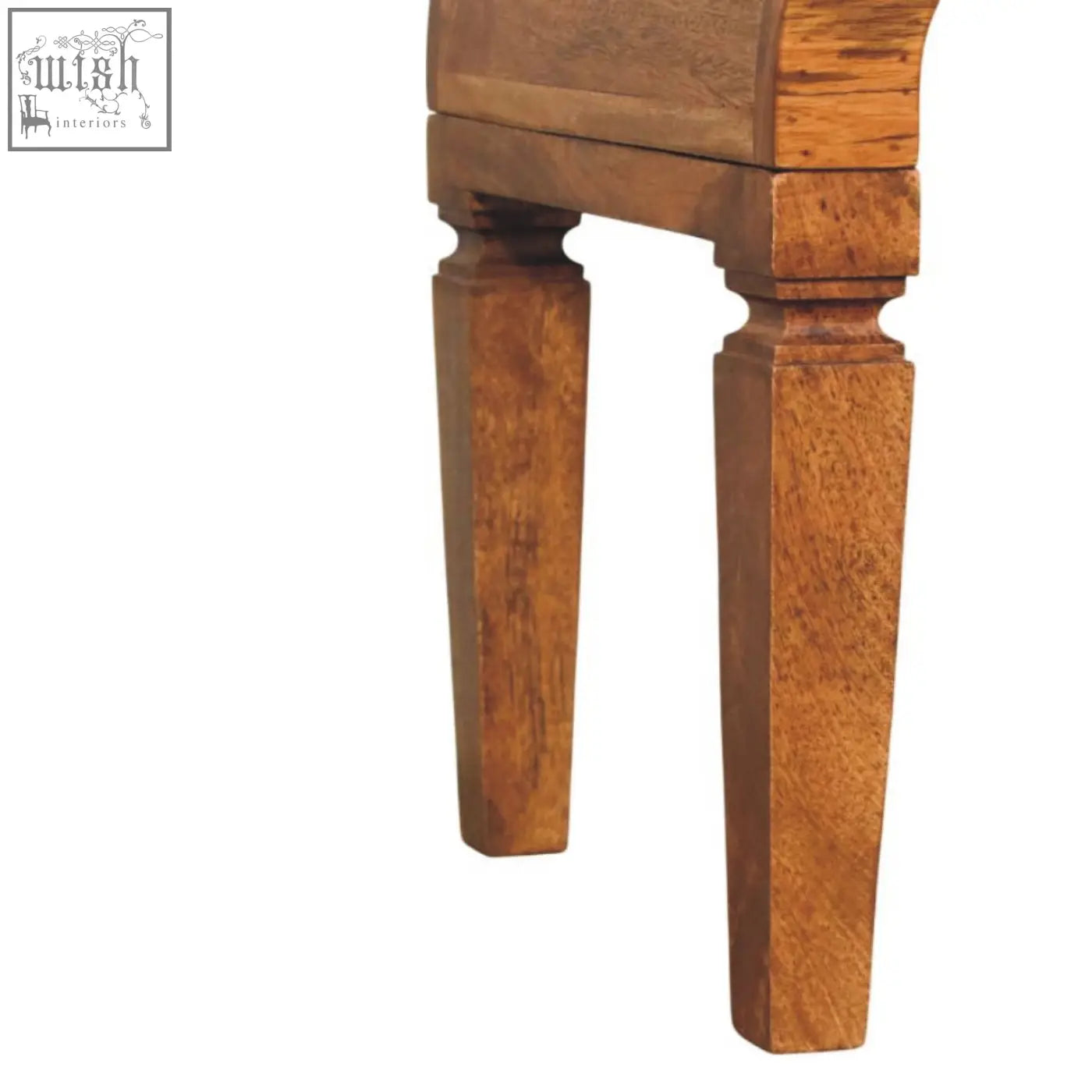 Solid wood table legs of the arcus coffee table in oak solid mango wood with a warm medium brown finish for living room