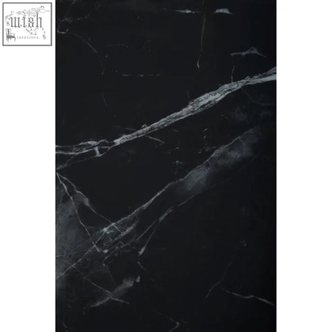 Black marble surface with subtle gray veining on arenza black marble and silver console table top