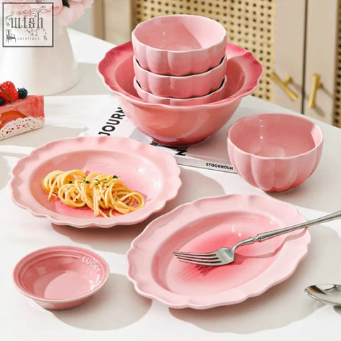 Set of pink ceramic bowls and plates with scalloped edges from the aria dinner set perfect for your dining set
