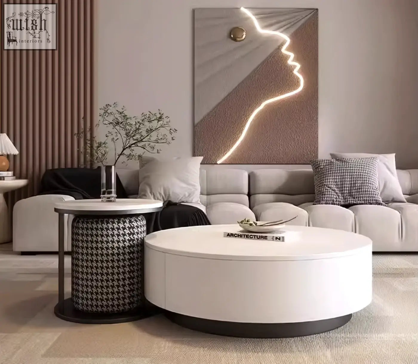 White oval marble coffee table with sleek black base and matching footstool coffee table offers modern style