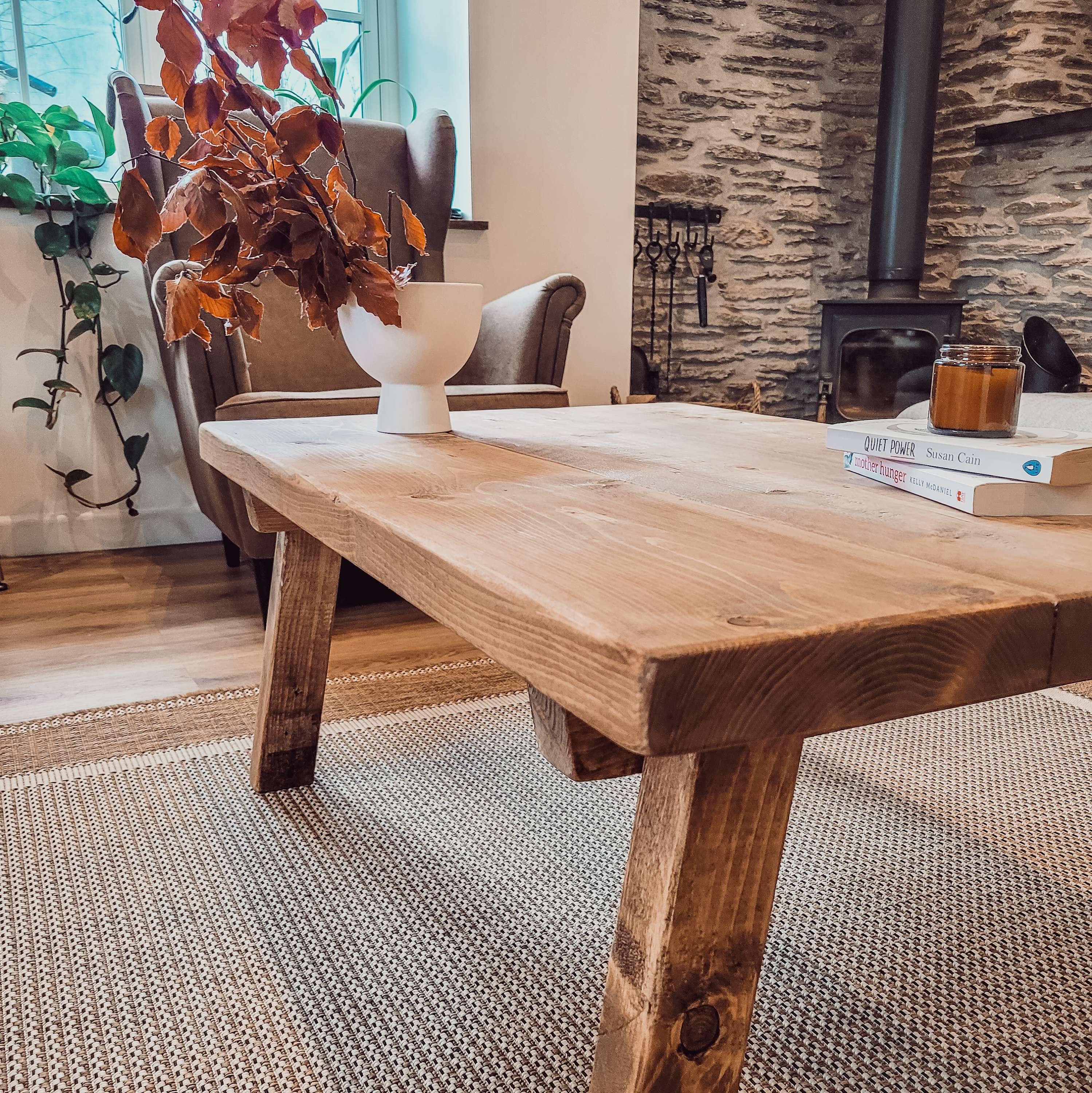 Rustic wooden coffee table aria rustic with thick sturdy legs and natural wood finish pictured table