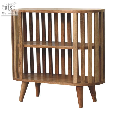 Ariella oval wooden side table in oak-ish mango wood with vertical slats and tapered legs inspired by japanese design